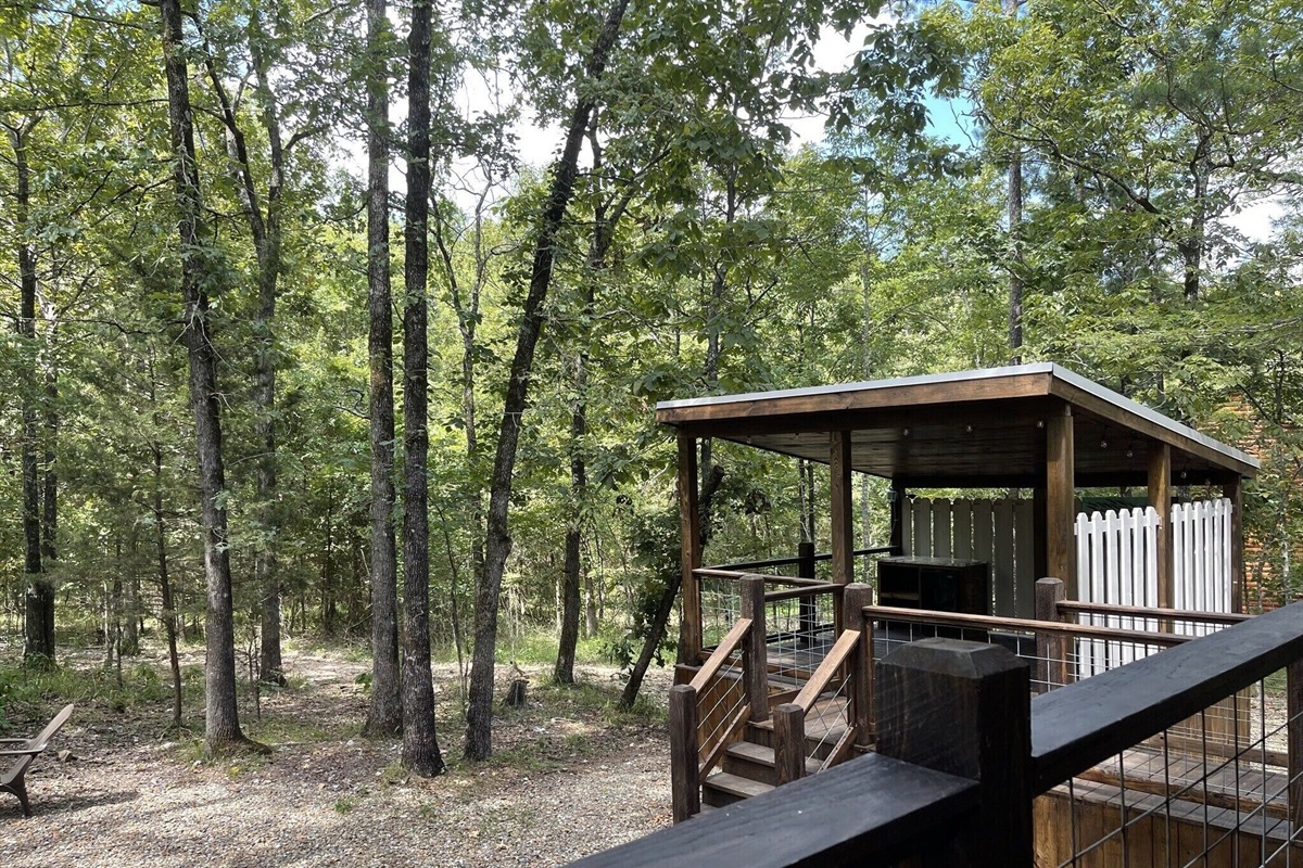 View of the hot tub area and out towards the Ouachita National Forest.
