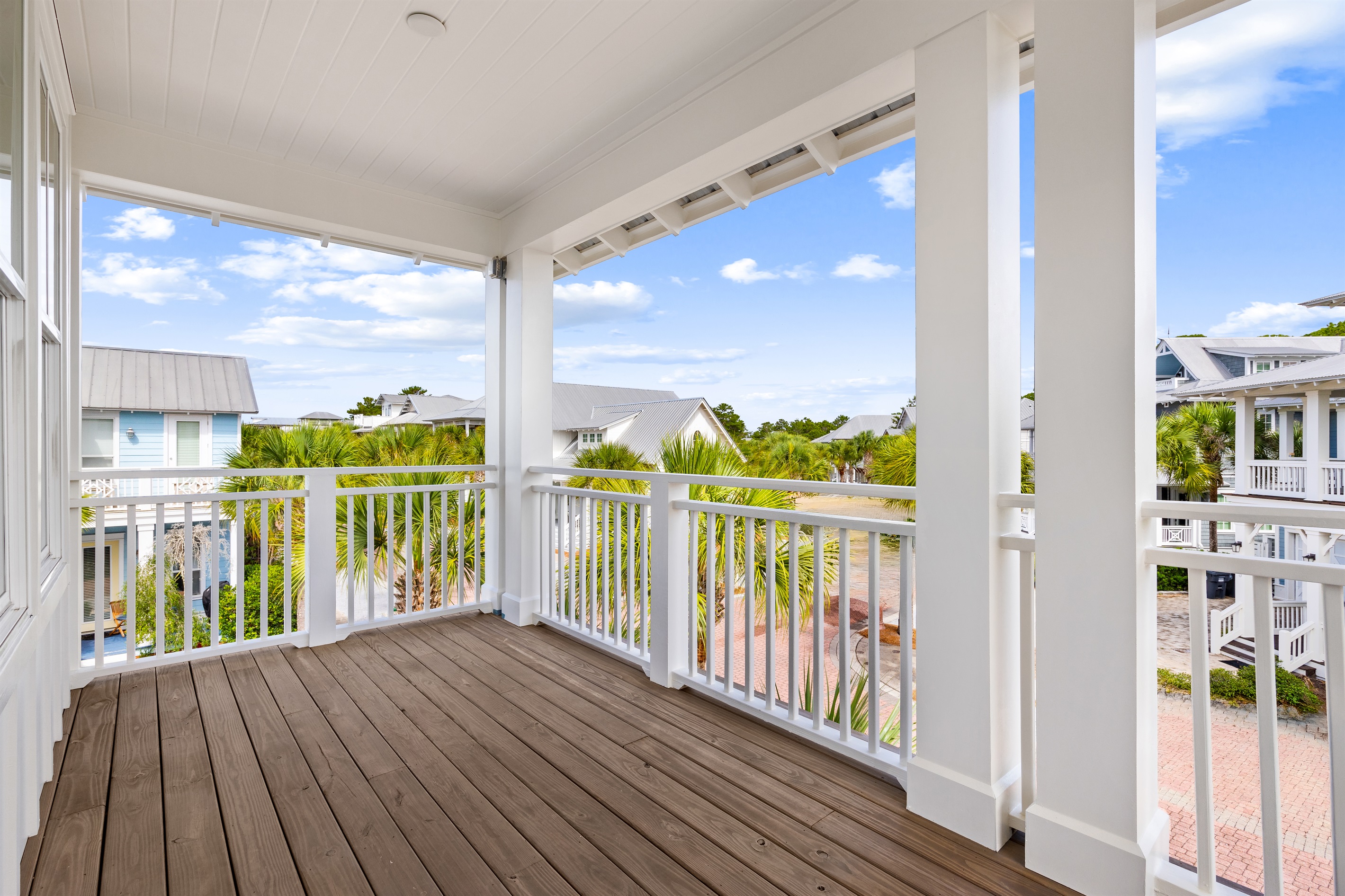 With comfortable seating and neighborhood views, this inviting outdoor space offers a peaceful place to unwind after a day on the beach.