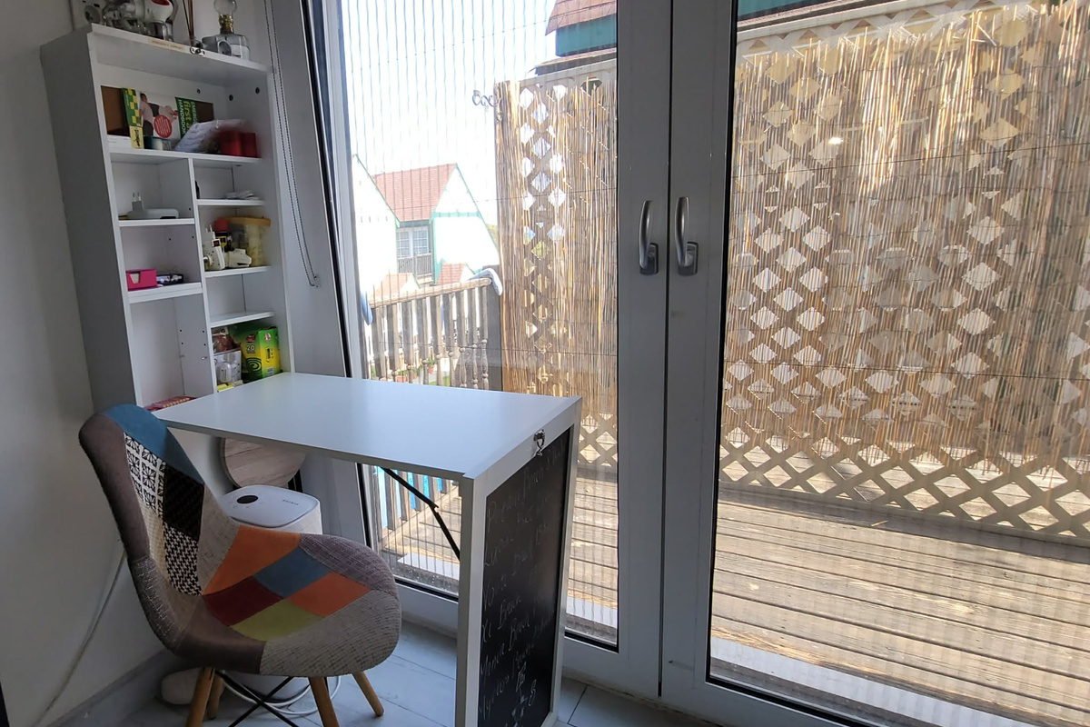 In the common area, emergency supply storage converts into a useful workstation