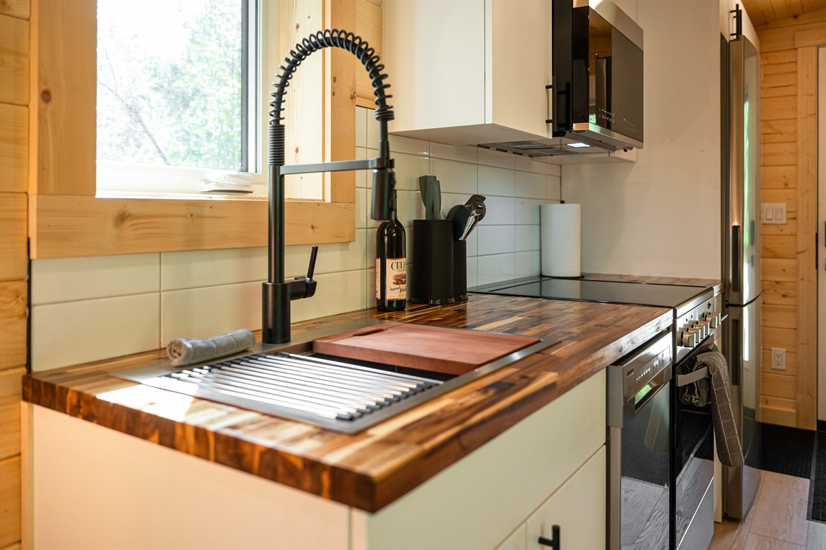 Butcher block counter tops, high end stainless steel appliances