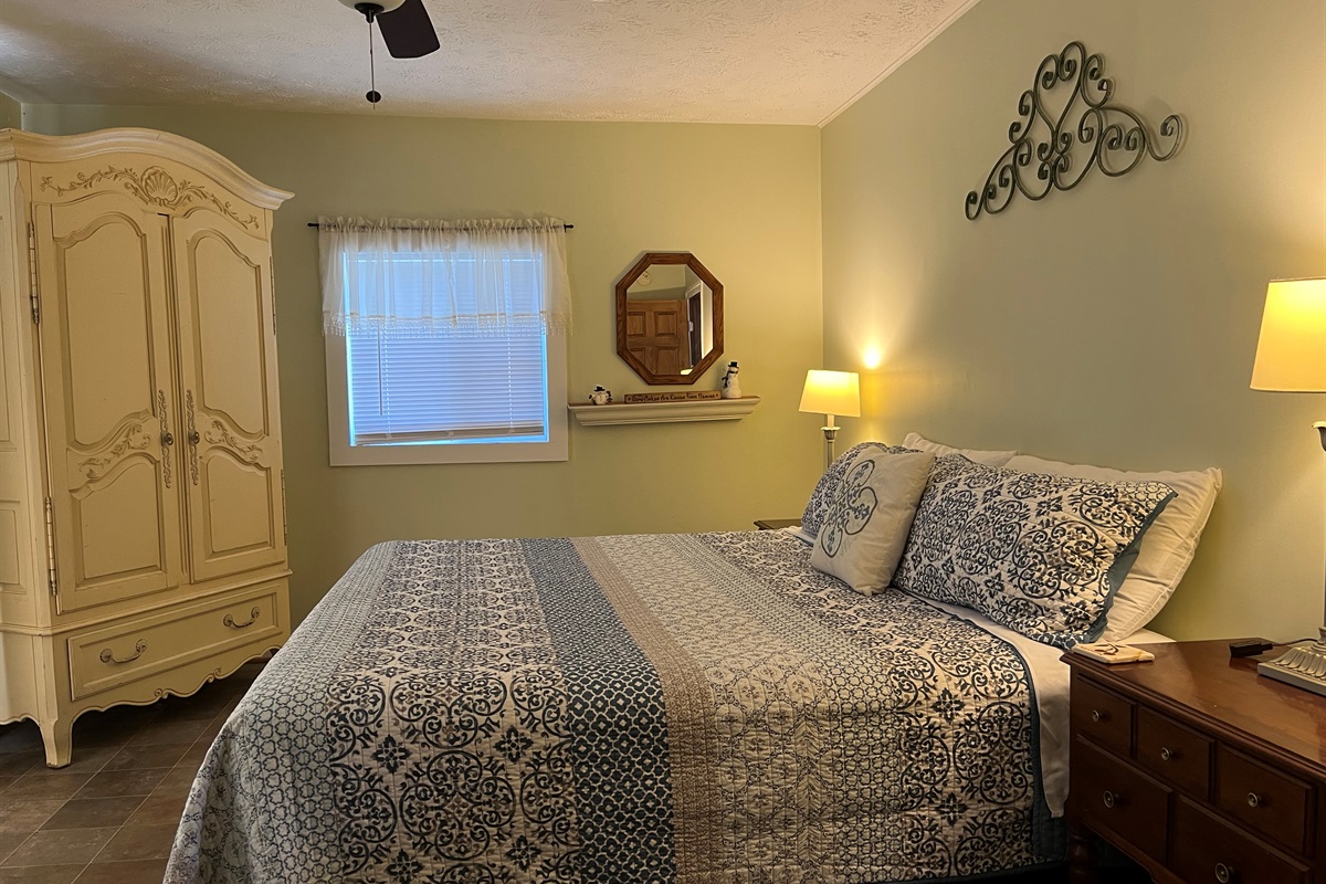 Master bedroom with a king bed.