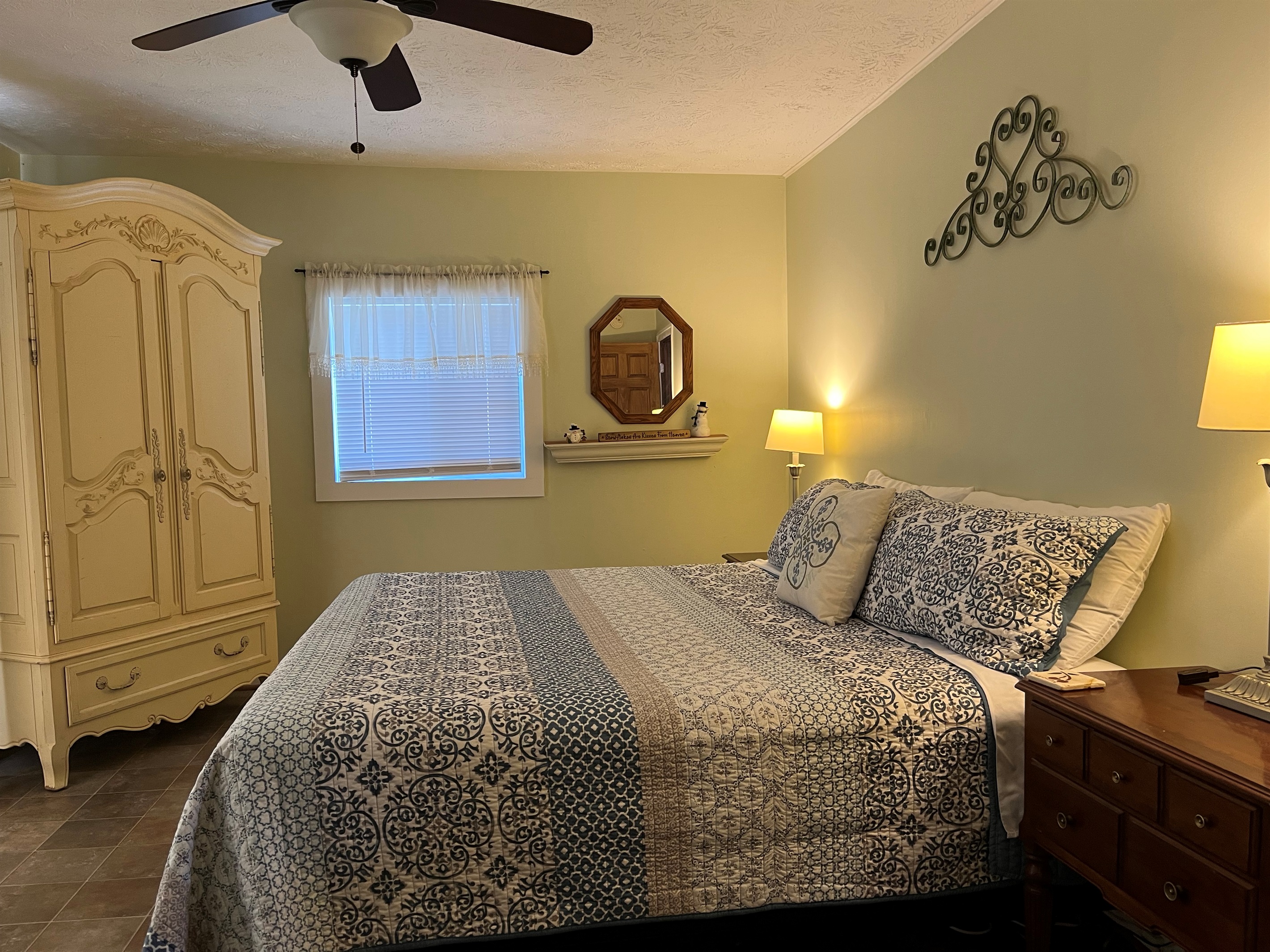 Master bedroom with a king bed.
