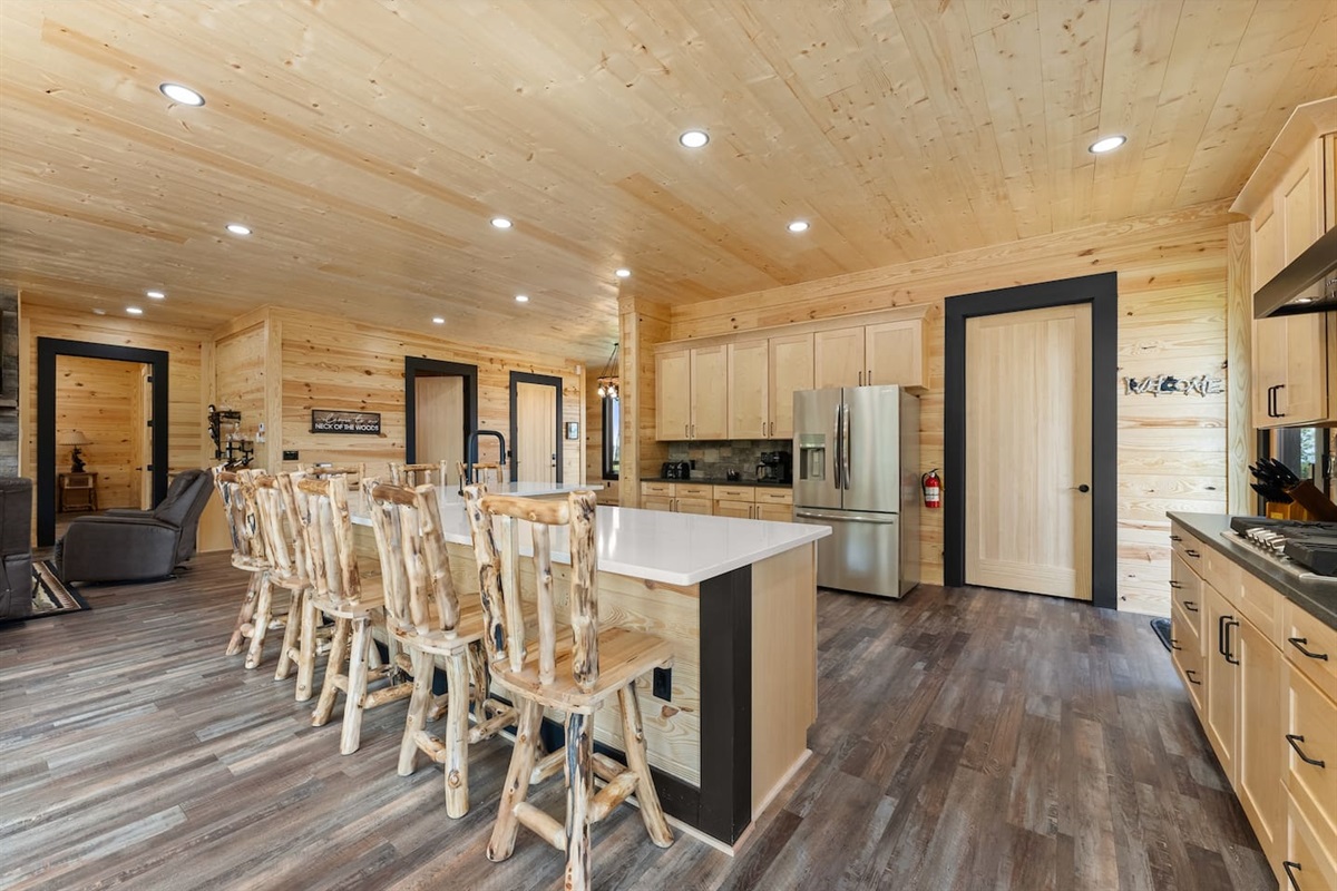 With seating for eight, this oversized quartz island is the perfect spot for casual meals, morning coffee, or late-night snacks with friends and family.