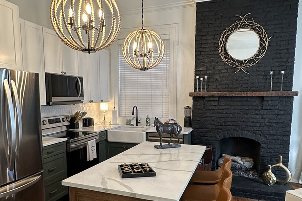 Large kitchen island with 3 leather barstools