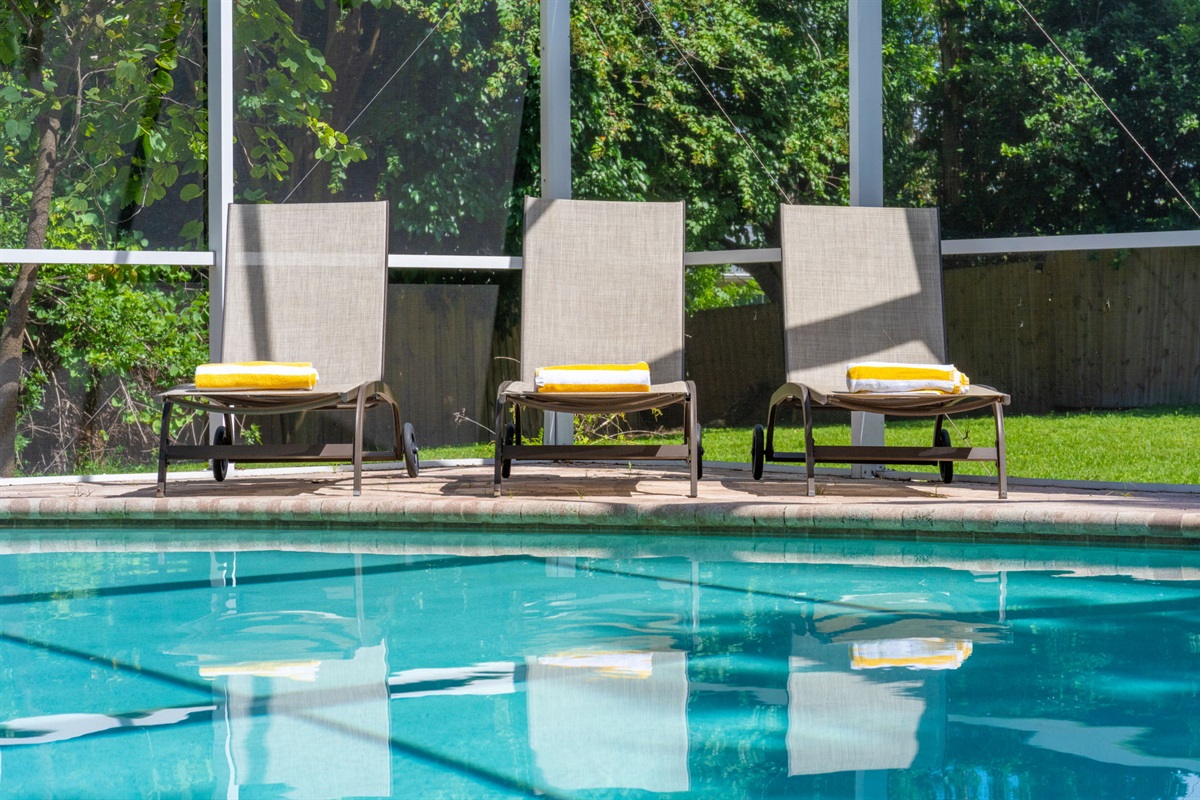 Enjoy your own private oasis with a sparkling pool and relaxing spa, perfect for sunny Florida living.
