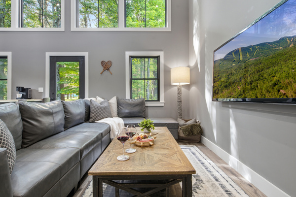 Kick back on the comfortable sectional and enjoy your favorite shows after a day of exploring.