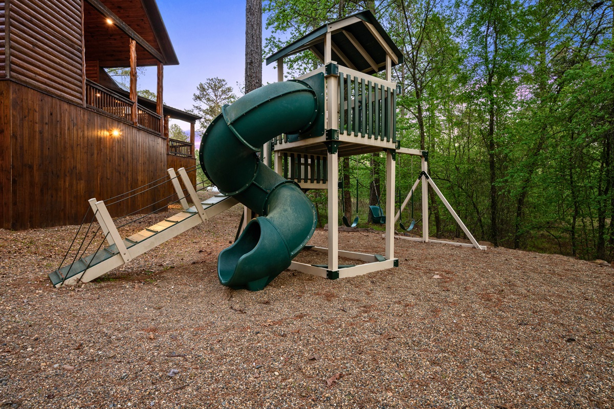 The playground area provides a fun and active space for kids, allowing them to play while adults relax and enjoy the surroundings nearby.