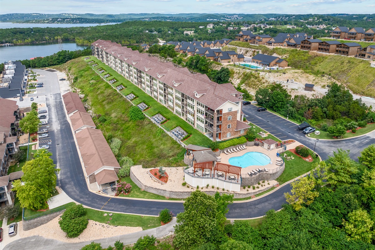 A sweeping exterior angle shows how close the building sits to Table Rock Lake and the surrounding hills.