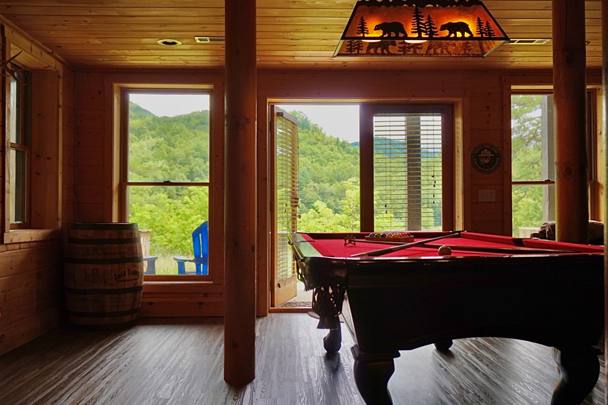 Enjoy a game of pool with stunning mountain views just steps away!