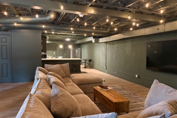 Open concept living room with easy access to kitchen