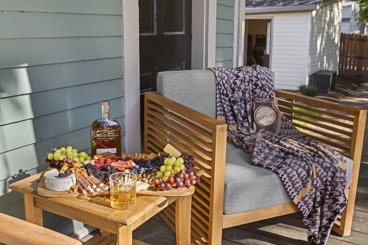 Settle into the back porch with Woodford Reserve, a charcuterie board, and nowhere else to be.