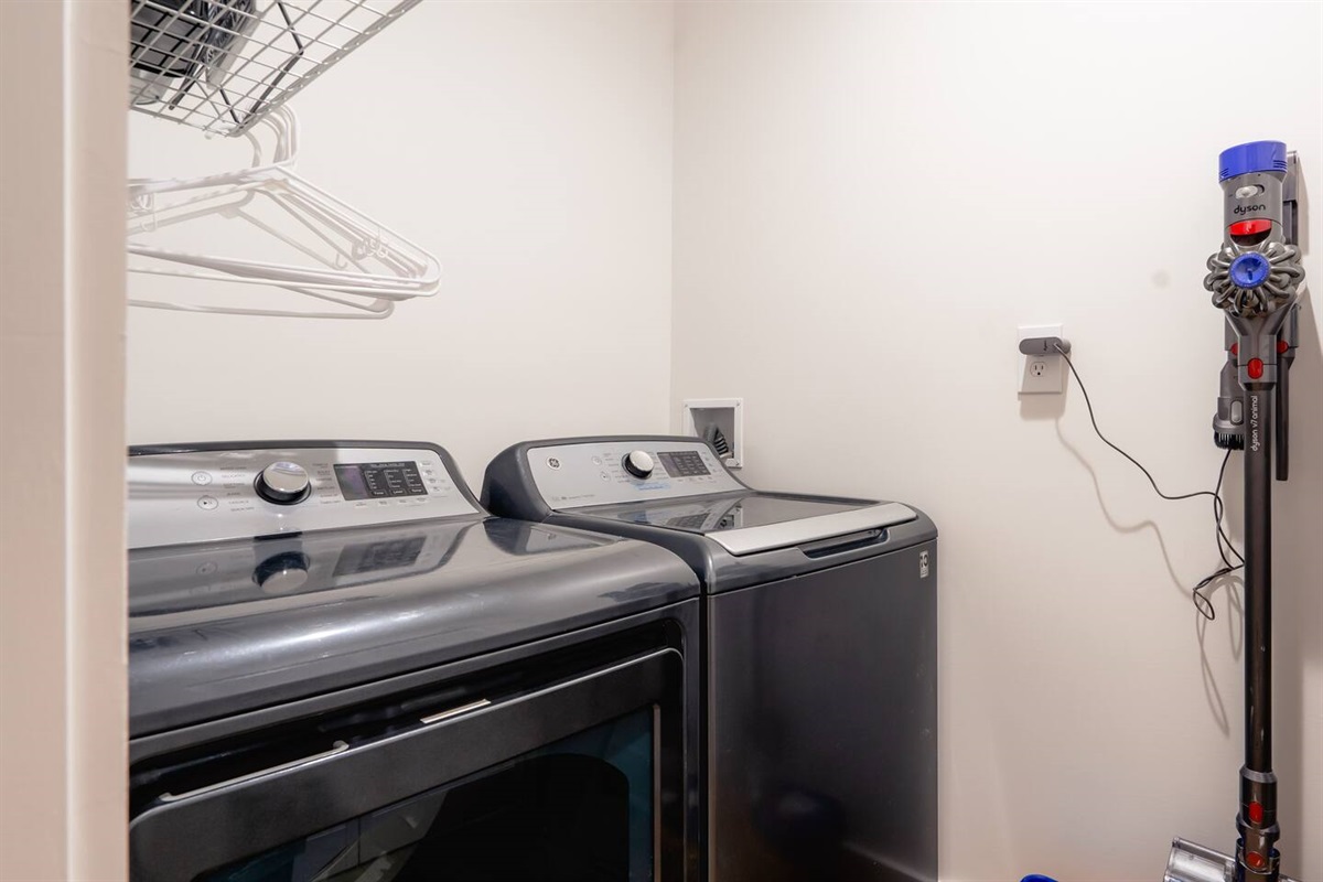 Laundry room in basement with Laundry soap provided. 