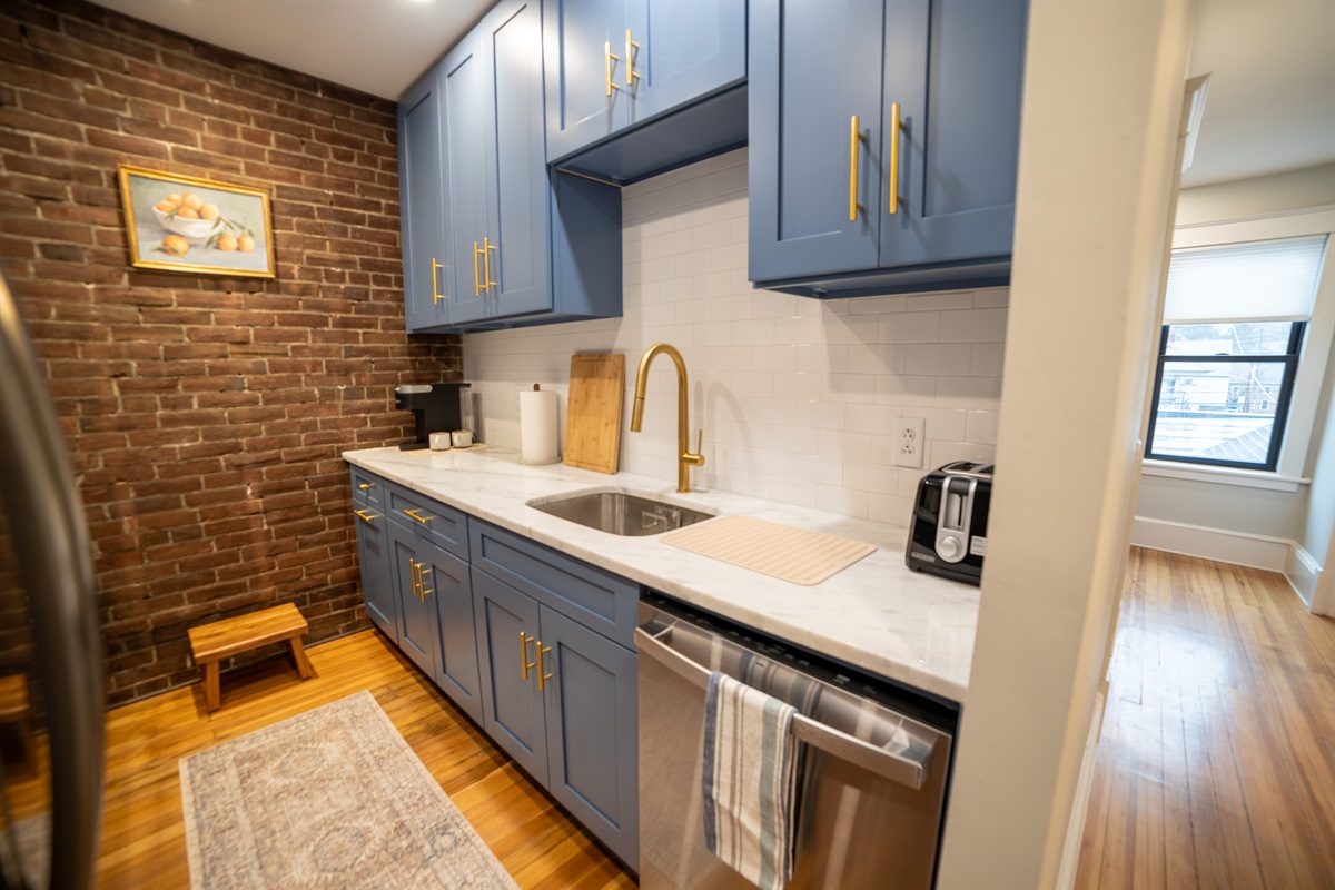 Newly remodeled kitchen with new cookware and appliances. 