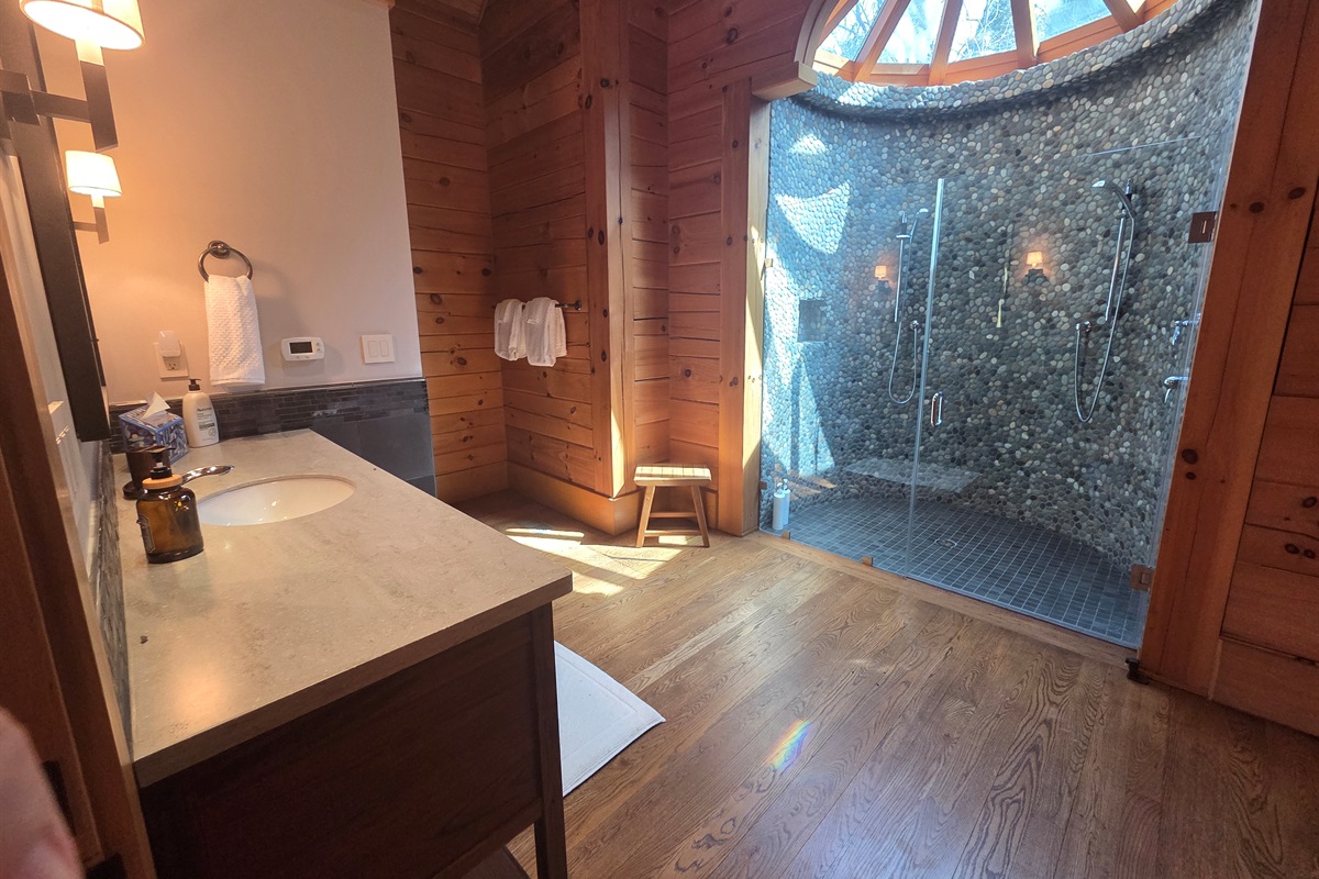 Enjoy a spa-like experience with a large walk-in shower located in the third bedroom’s bathroom.