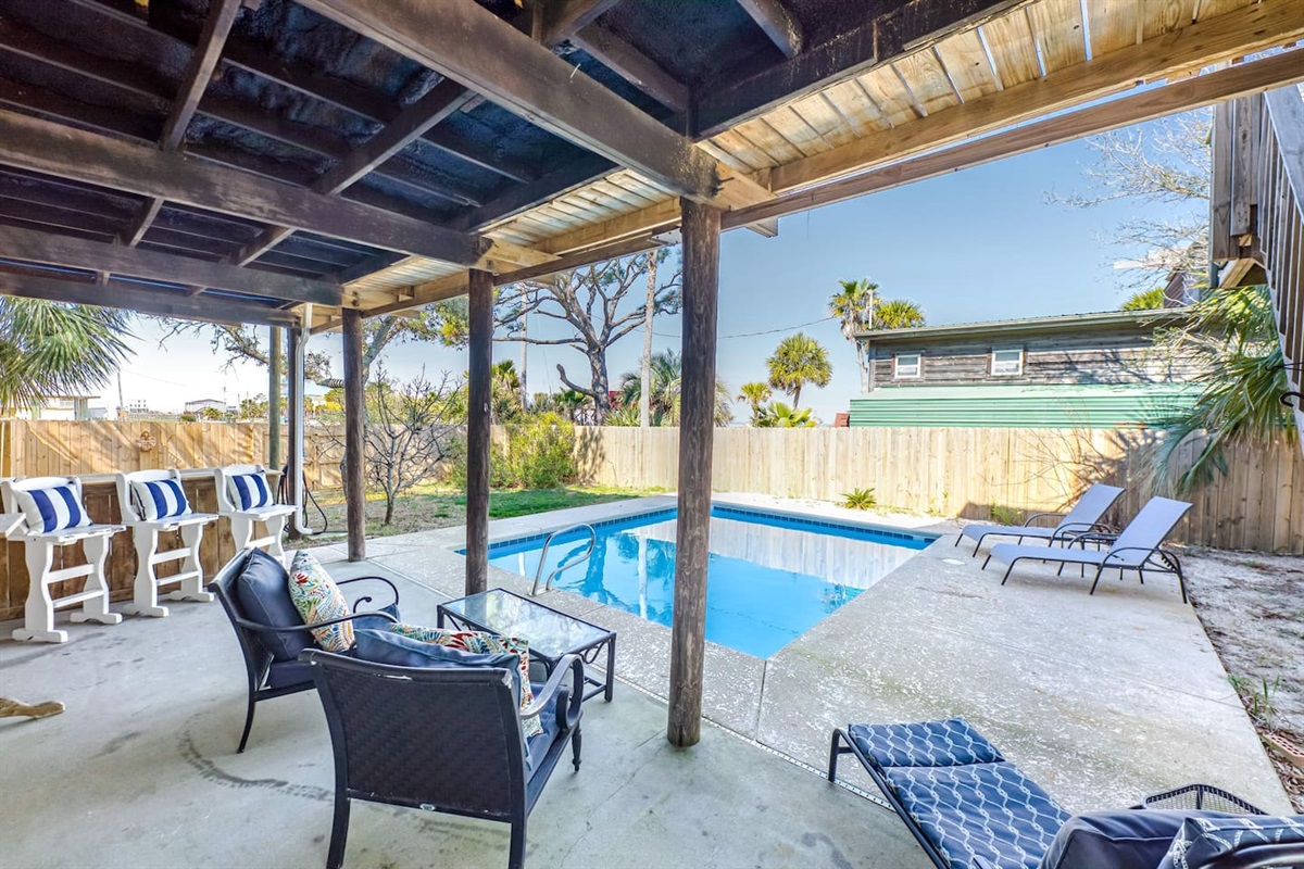 Outdoor Oasis: Dive into relaxation by your private pool, surrounded by lush greenery and sunshine!