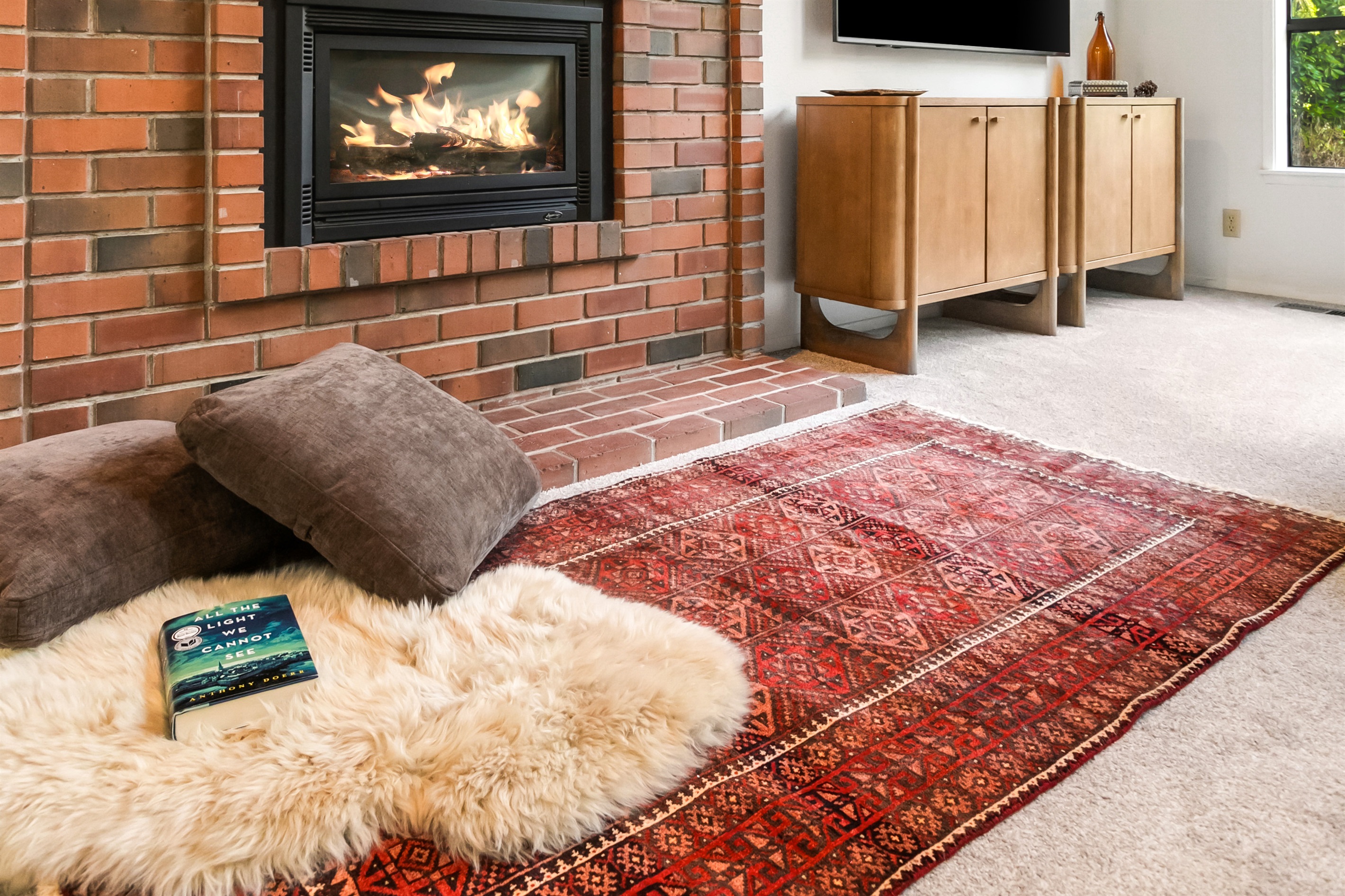 Grab a book from the reading library and curl up next to the fire.