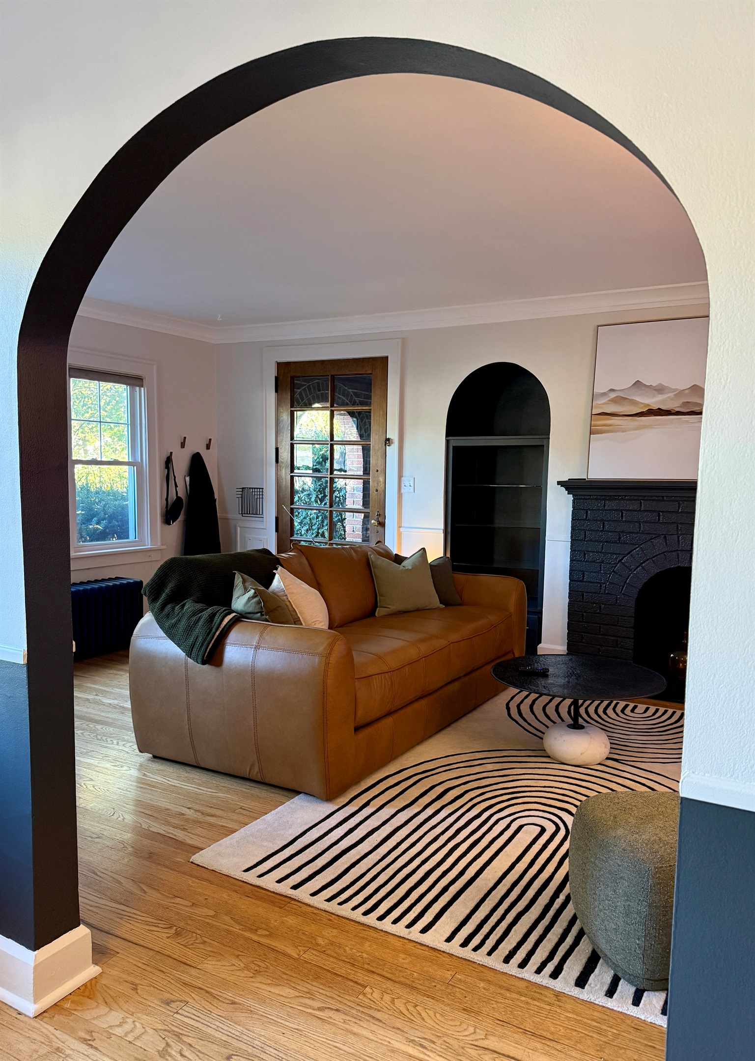 Original archways throughout the home bring a sense of calm and creativity to the space.