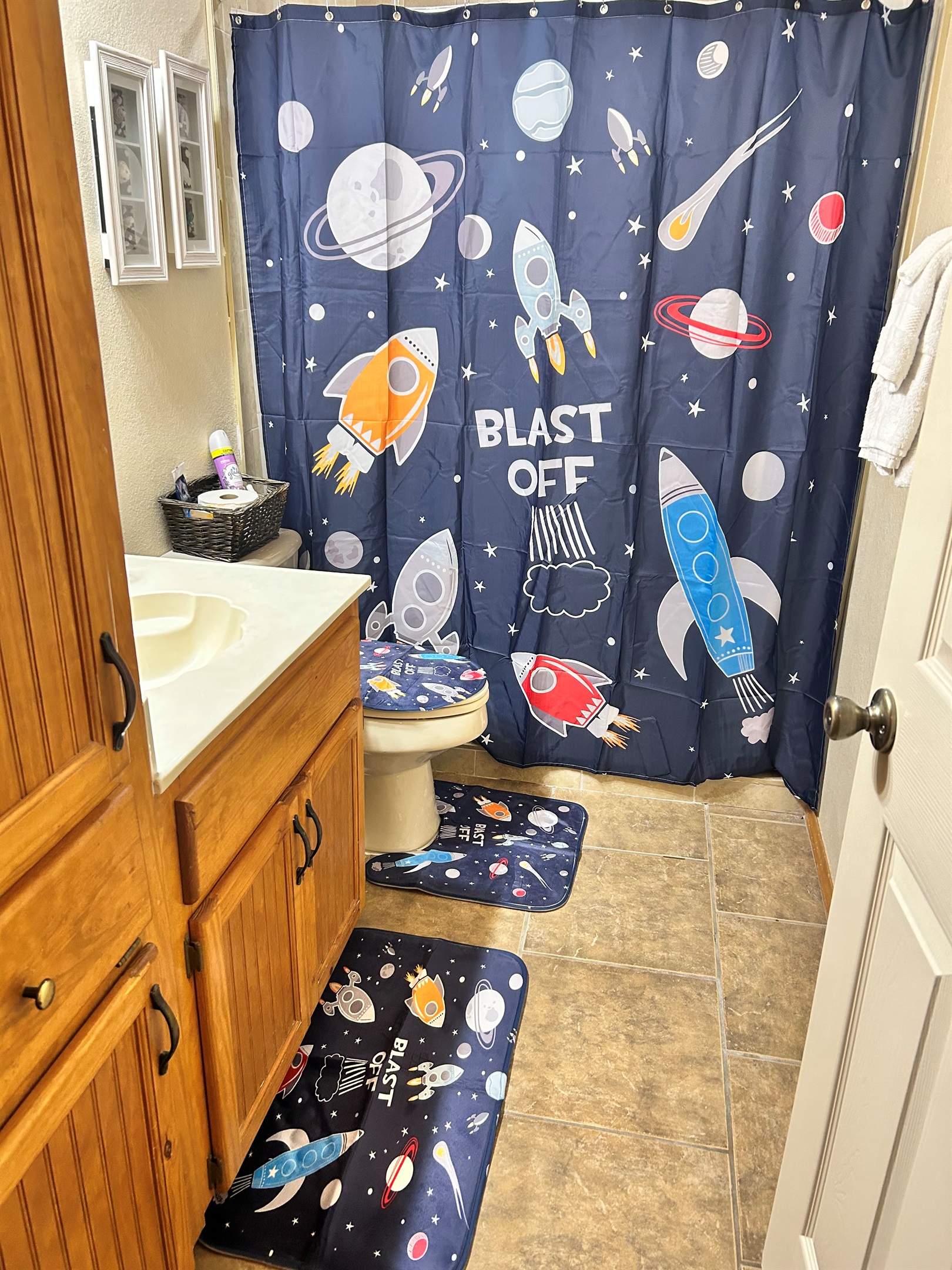 Ground floor bath servicing the bunk room and pool areas with walk-in shower with bath toiletries provided. 