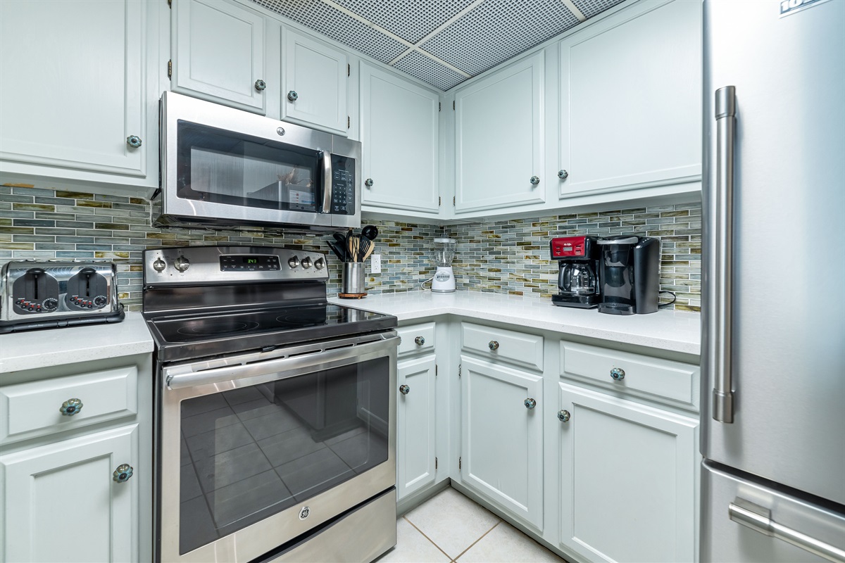 Bright and airy kitchen with ample counter space and modern amenities, creating an inviting space for cooking and gathering.