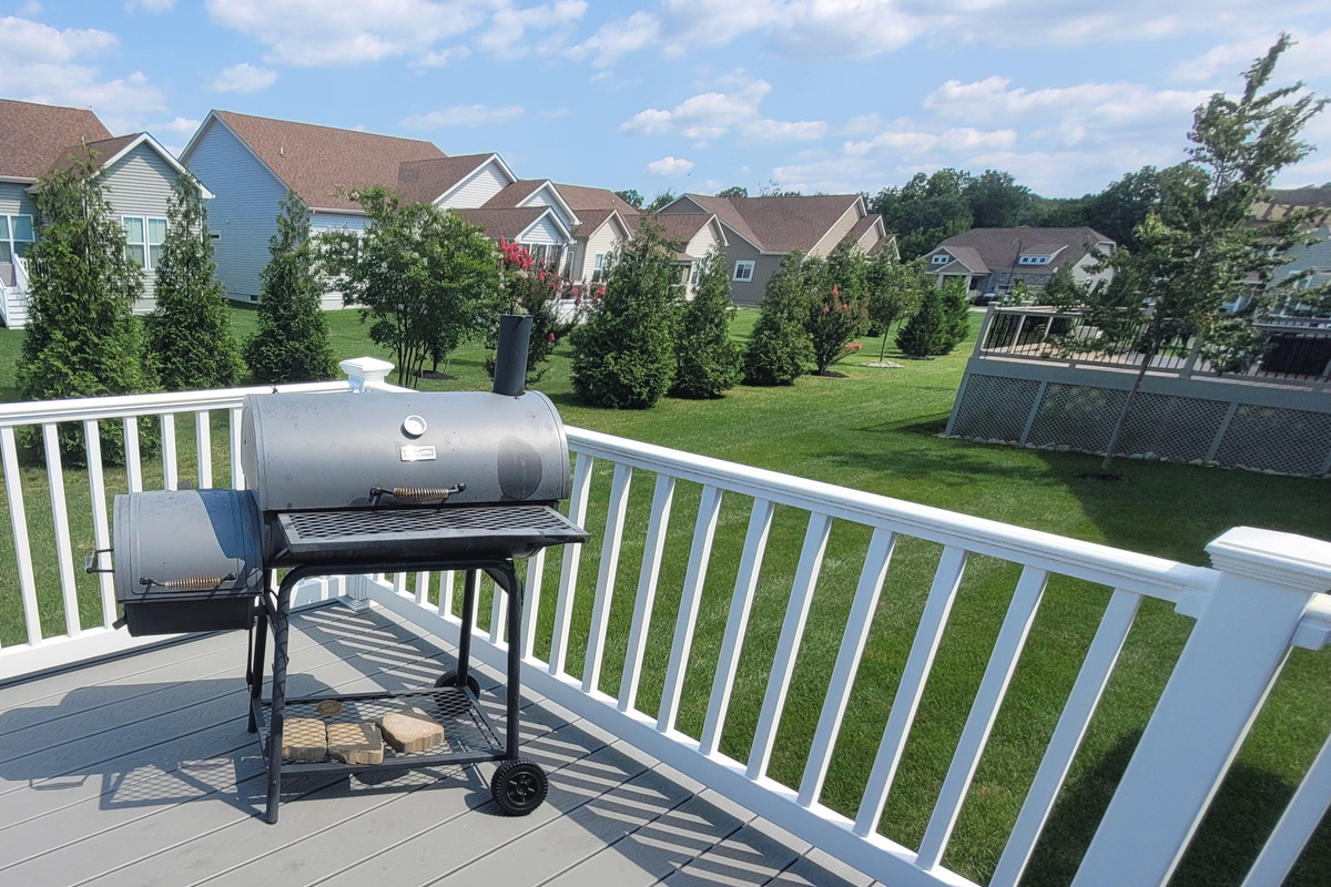 Dedicated charcoal grill station for long-term residential cooking and meal prep.