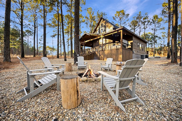 Gather around the fire pit with Adirondack seating for relaxed evenings outdoors.
