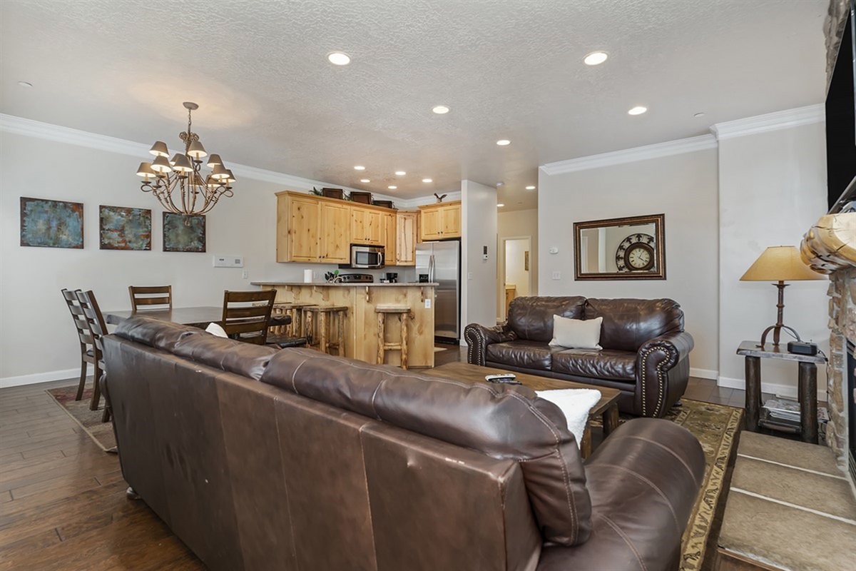 An open-concept living area seamlessly connects kitchen, dining, and lounge spaces—ideal for entertaining and effortless group living.