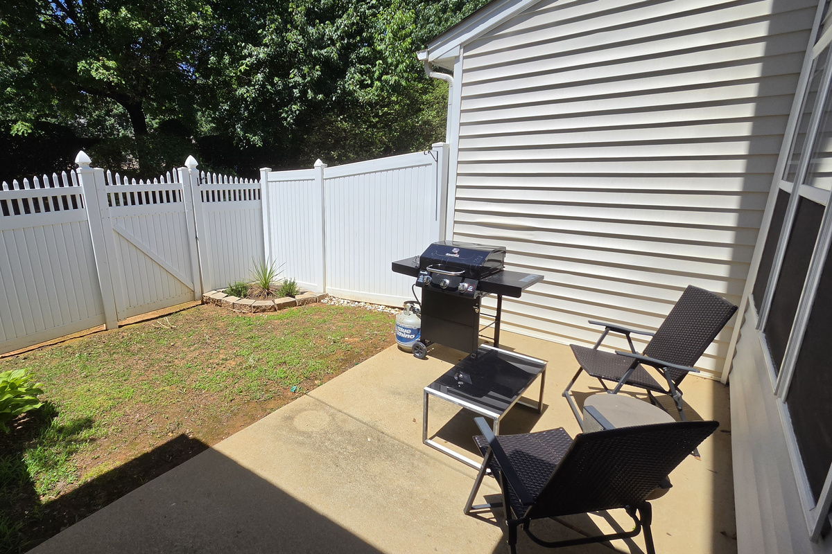 Backyard with grill and outdoor seating