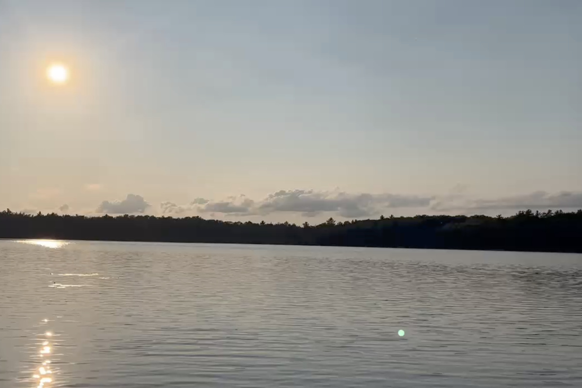 Out on the fishing boat on Little Sand Lake at sunset! 
