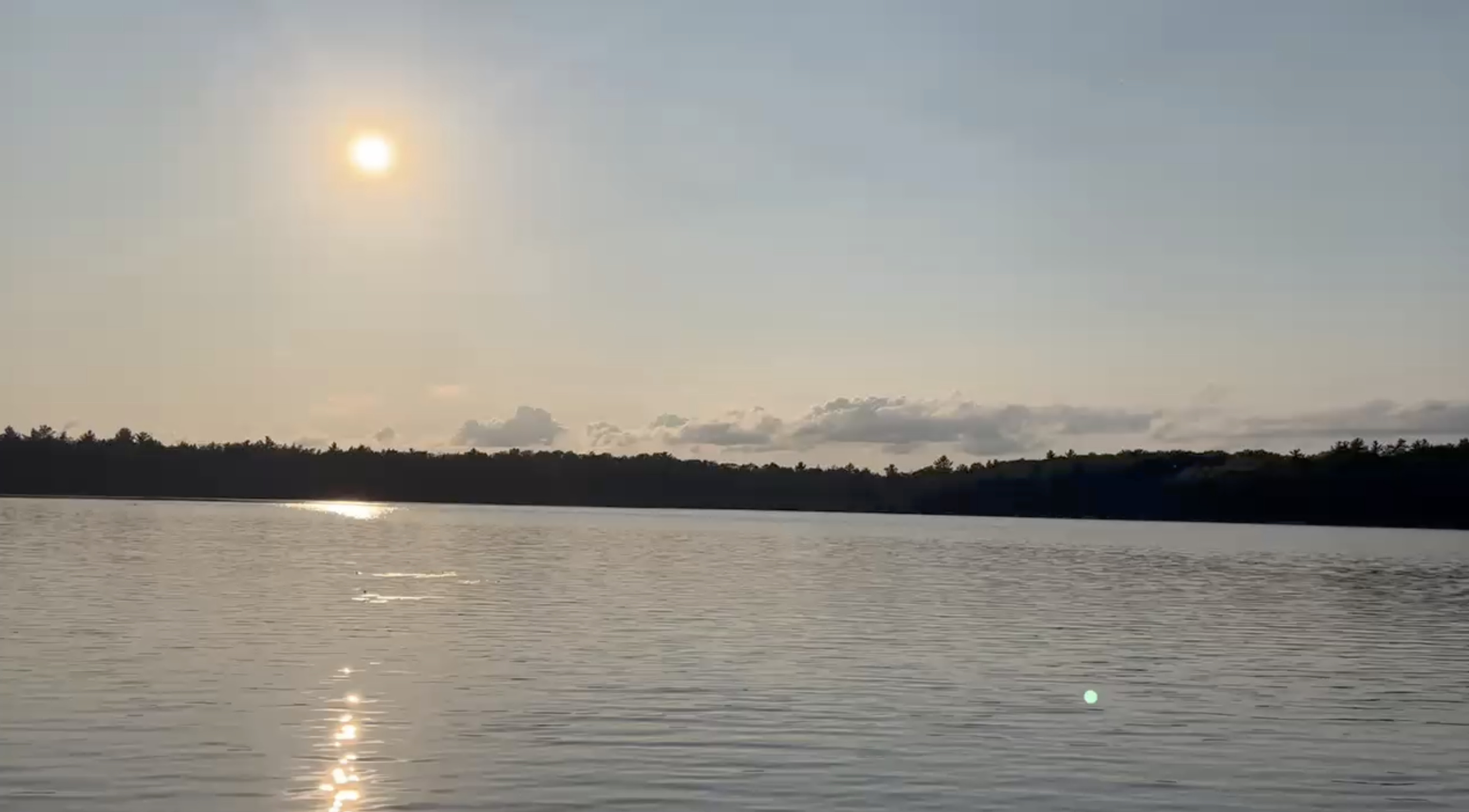 Out on the fishing boat on Little Sand Lake at sunset! 