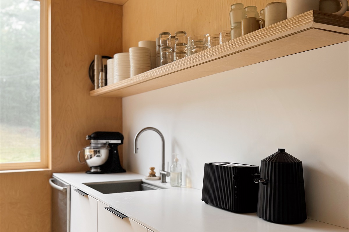 Kitchen with Kitchenaid mixer and Alessi juicer.