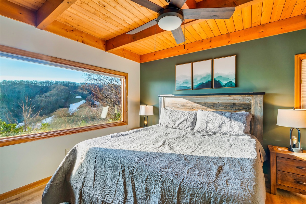 Lower Level King bedroom with premium bedding & pillows to unwind after a day exploring Gatlinburg