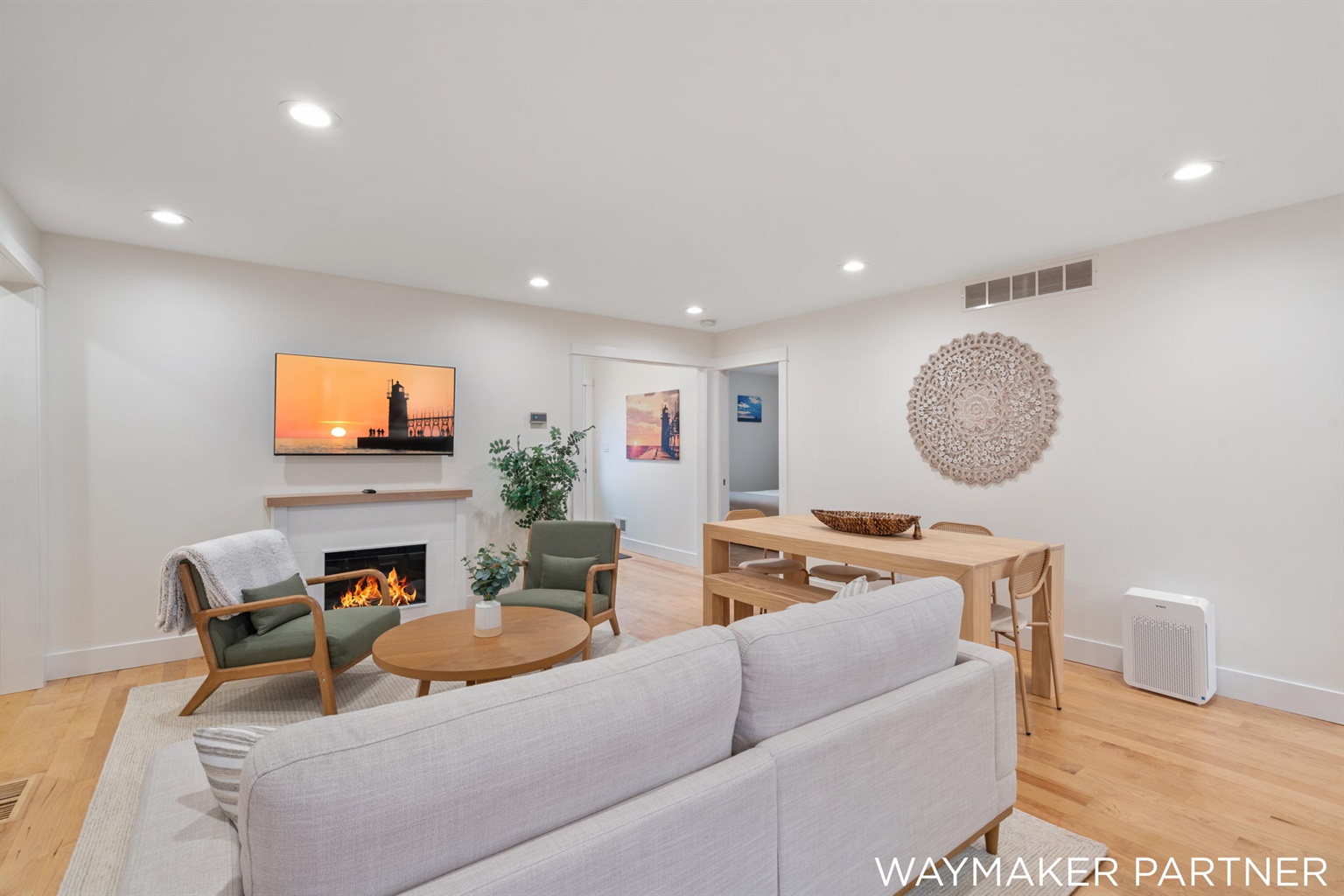 Walk through the front door to this elegant space with a cozy fireplace and shared sitting and dining space.