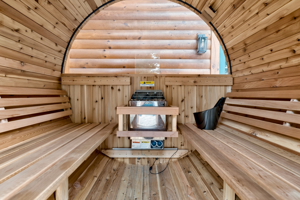 Wood-lined barrel sauna interior