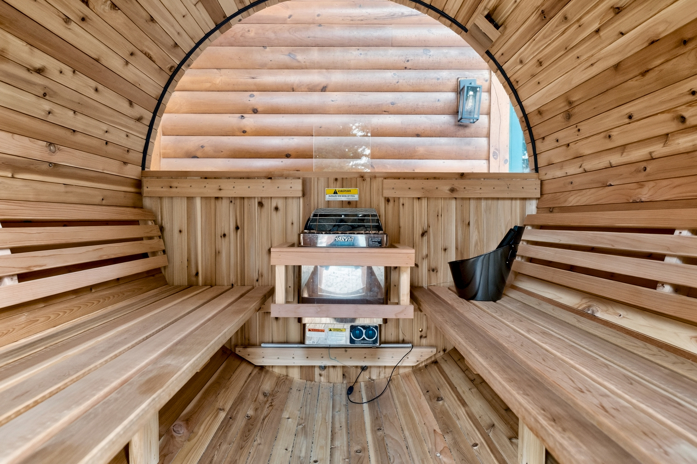 Wood-lined barrel sauna interior