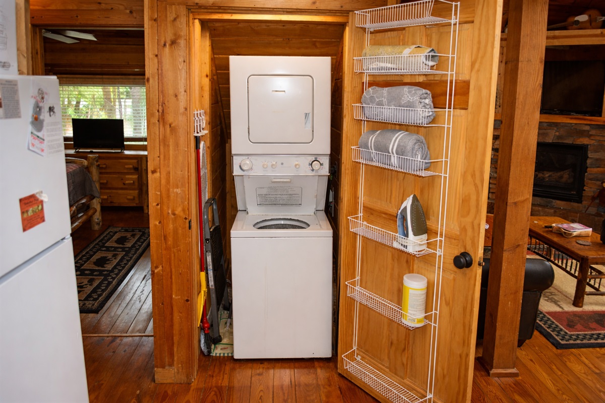 Complete with washer, dryer, ironing board, iron and detergent.