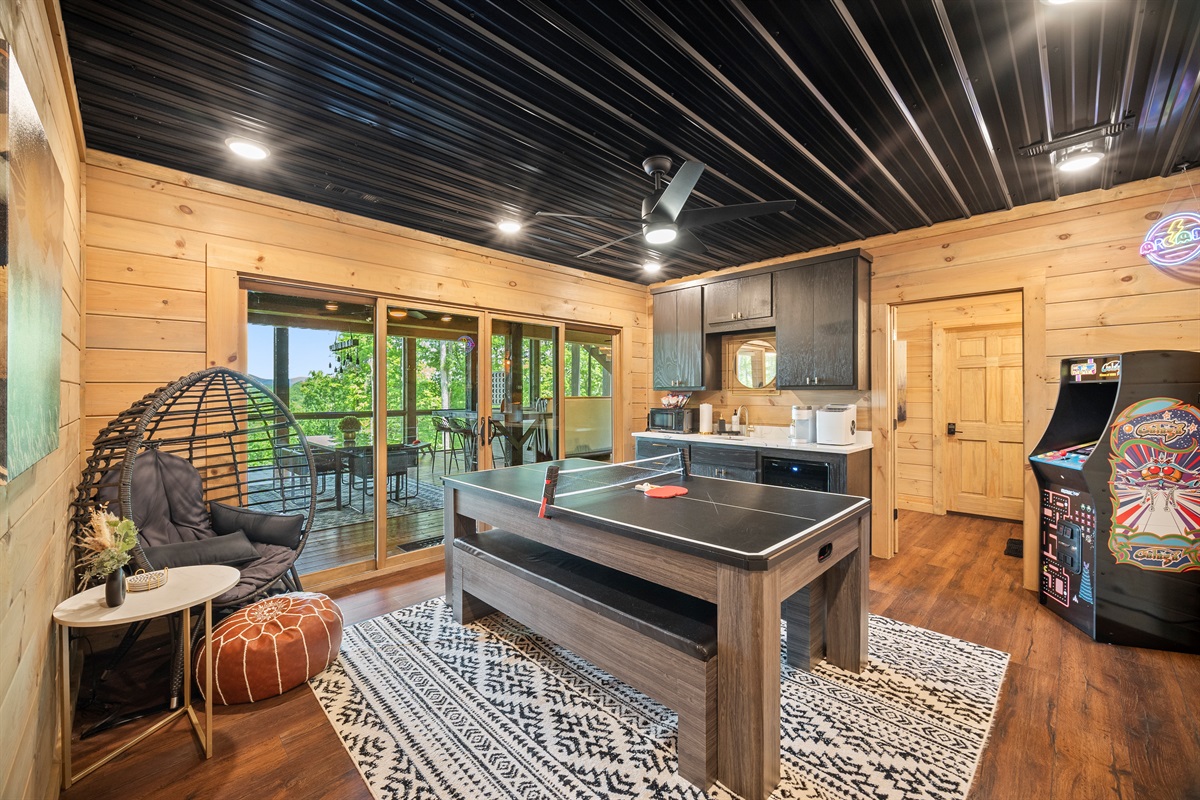 Cozy seating and beautiful views make this outdoor living space an ideal spot to enjoy the fresh mountain air.