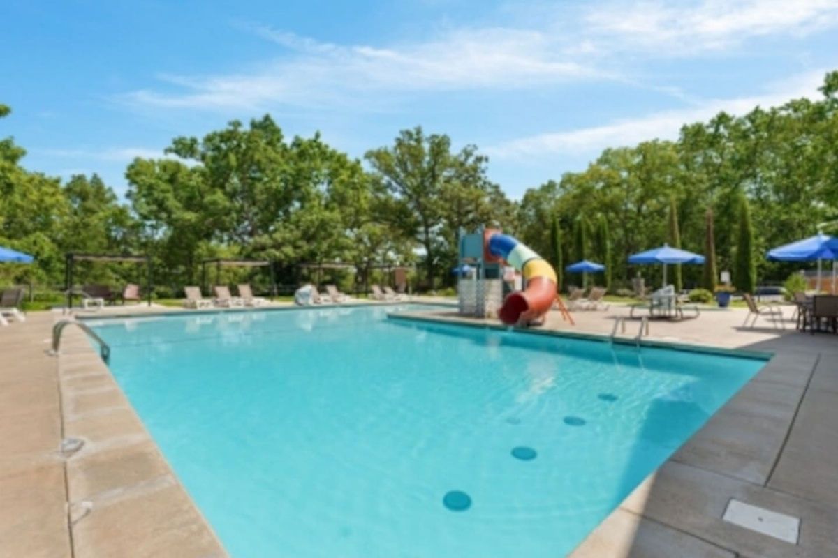 Outdoor resort pool and splash area for unforgettable summer family trips. Open Memorial Day to Labor Day