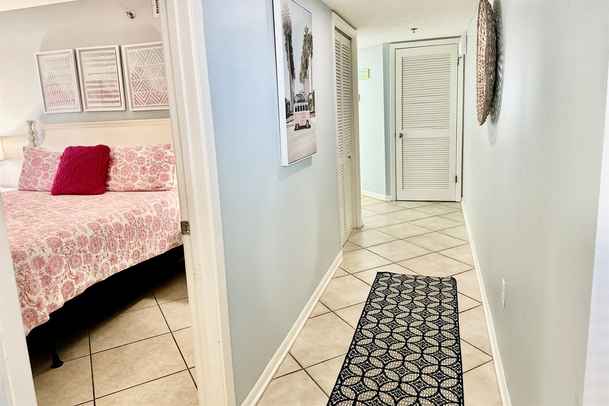 As you step inside, you'll see the guest bedroom to the left.