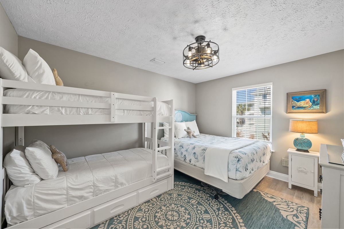 2nd floor queen bed with twin/twin bunk bed. Connects directly to the bathroom.