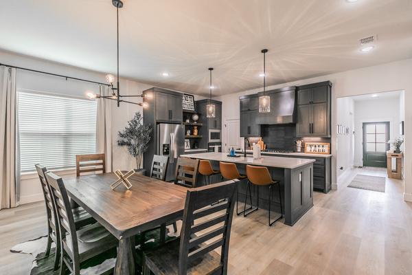 Updated, modern kitchen with large dining table