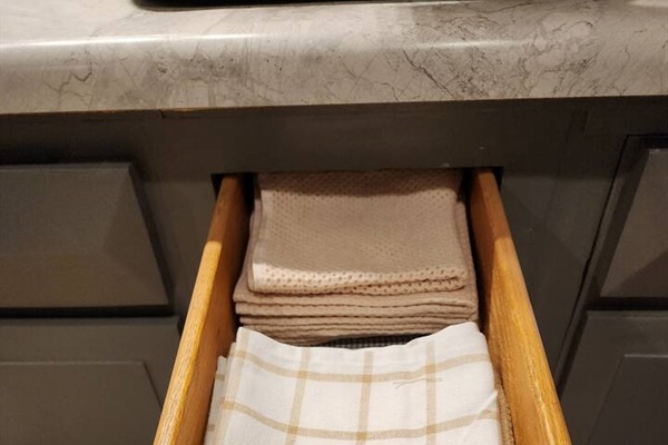 Kitchen towels and dish rags provided. 