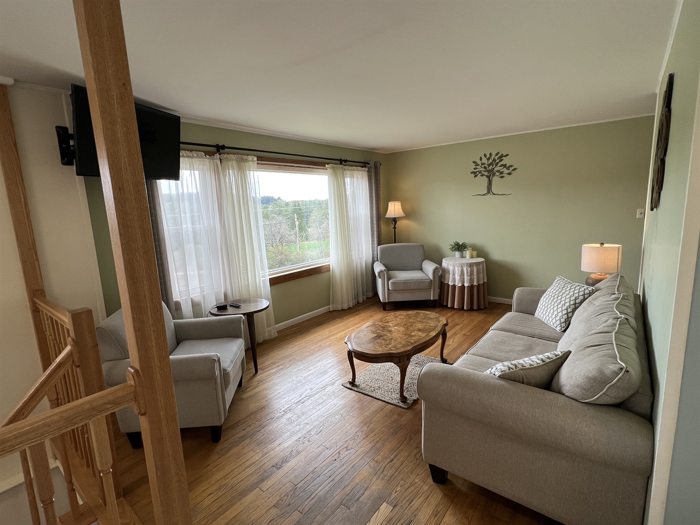 Living room with large windows to take advantage of the amazing view of the rolling hills landscape.