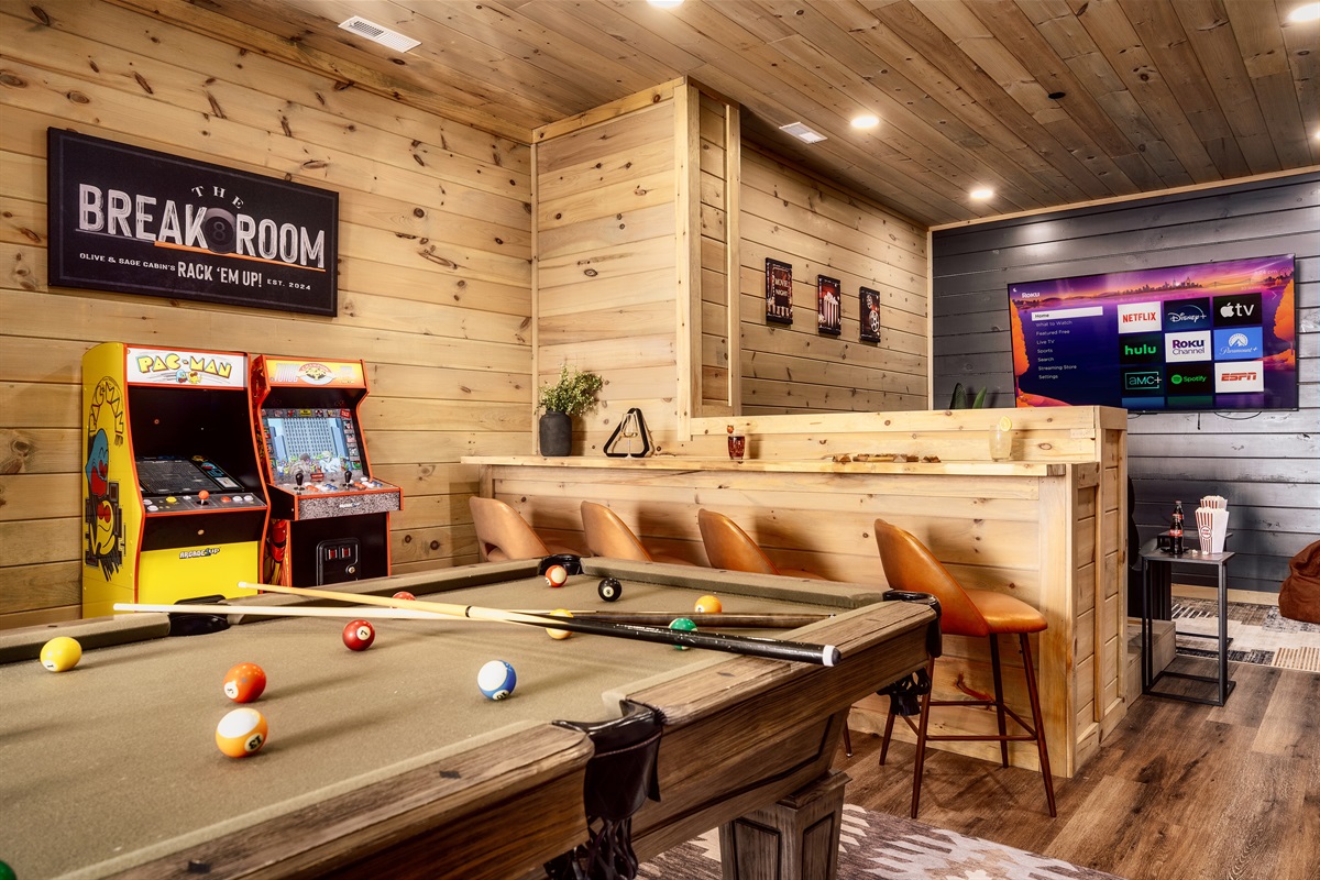 The ultimate entertainment zone. Pool, arcade, and a full theater setup.