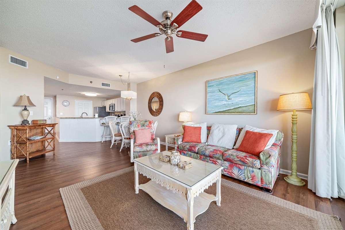 An inviting open-concept living and dining area, perfect for entertaining or relaxing in comfort.