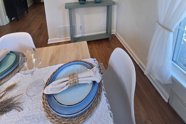 Set to impress—elegant dishes, warm lighting, and timeless charm.