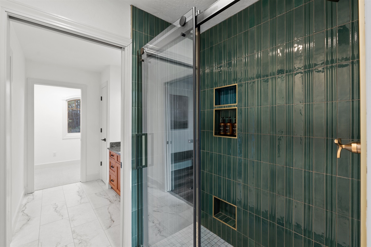 Walk in shower with luxury tile.