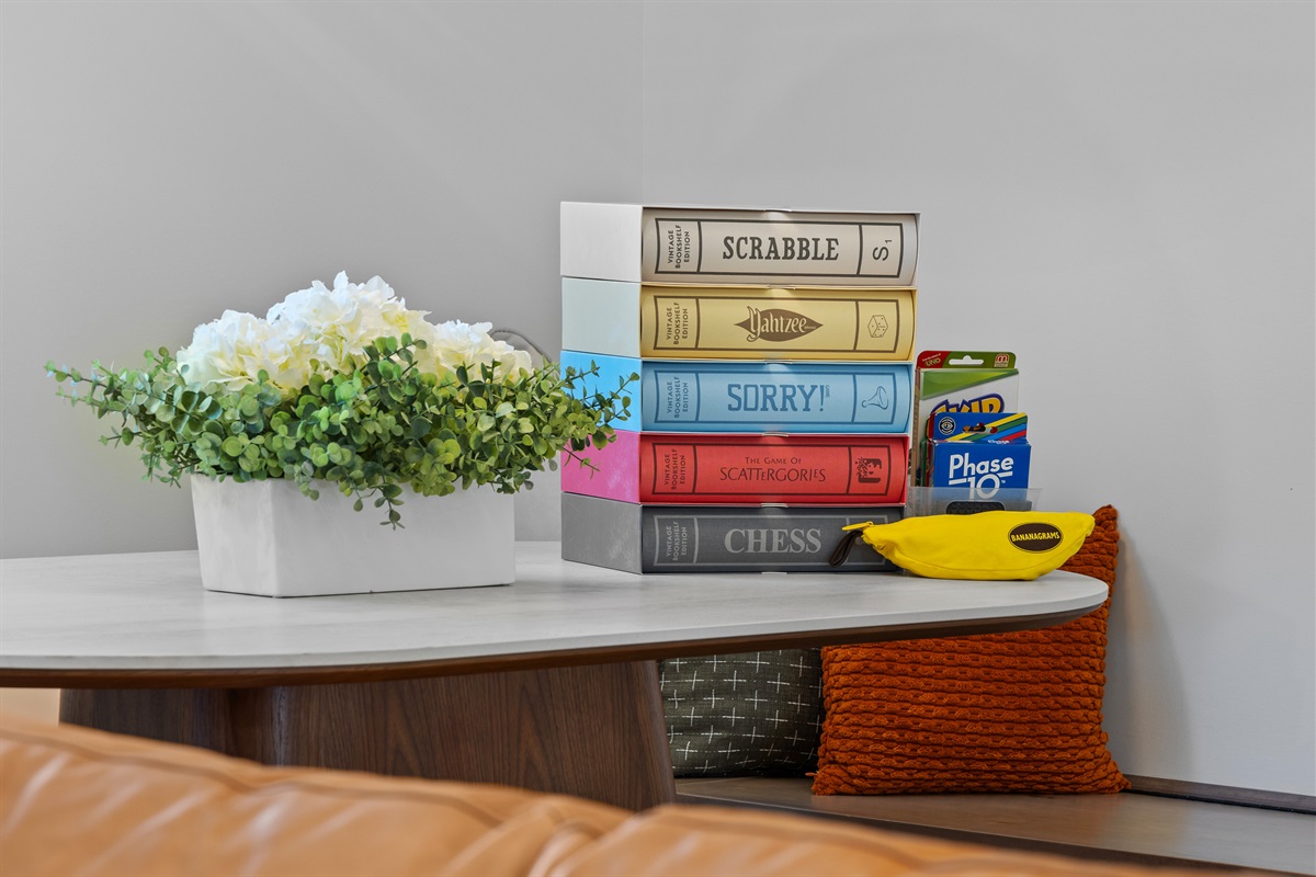 A stack of classic games for cozy nights in.