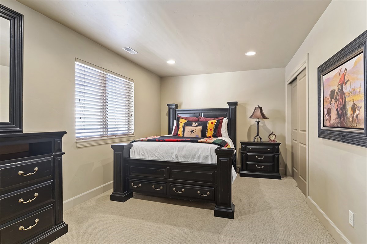 A comfortable bedroom retreat with warm finishes and a peaceful atmosphere for a great night’s sleep.