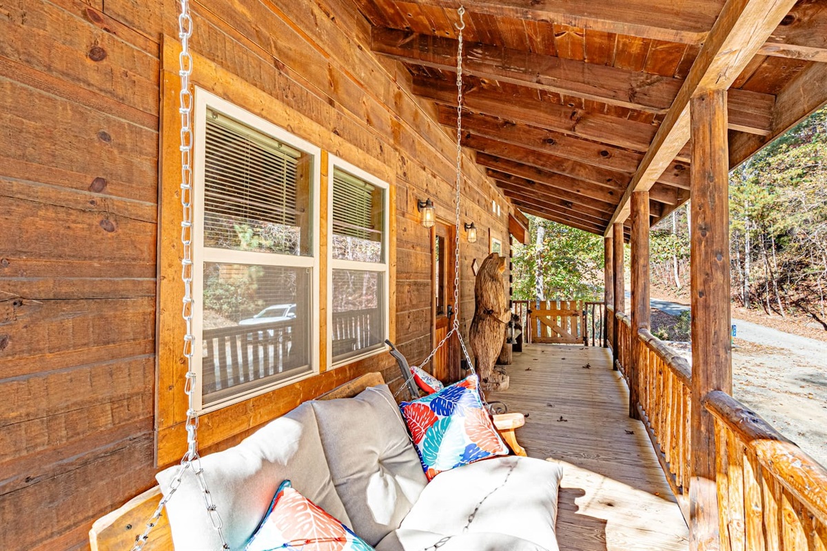 Front Deck
Enjoy watching deer stroll by! Large wrap around, fully enclosed upper deck with swing, seating and charcoal gill- deck overlooks the French Broad River.