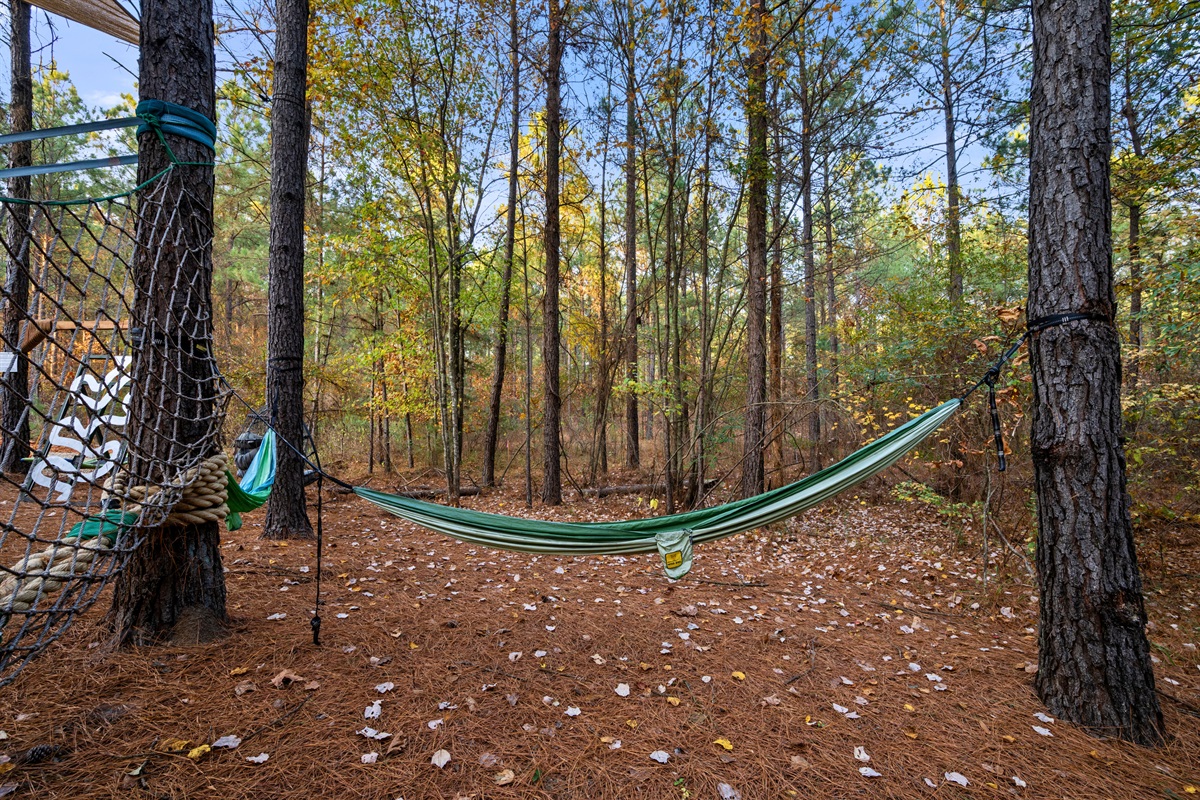 This hammock spot is a peaceful place to unwind, offering a quiet moment under the trees whenever you need a breather.